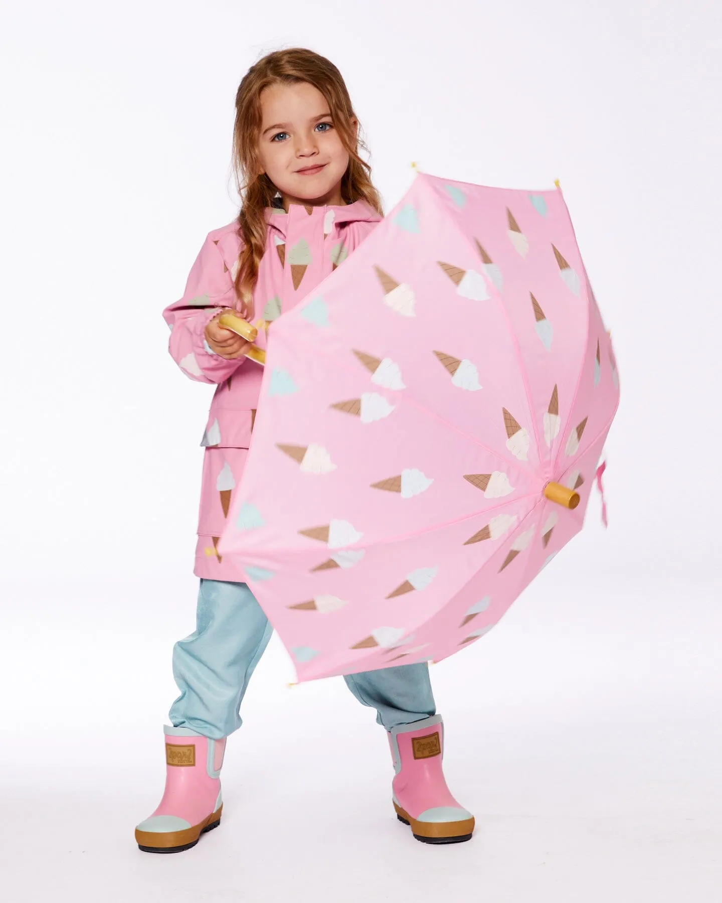 Pink Umbrella With Cones That Change Color Upon Contact With Water